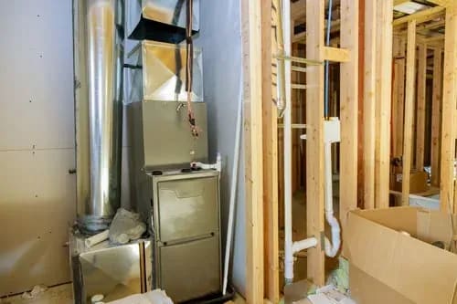 Residential boiler and heating system installed in a basement utility room