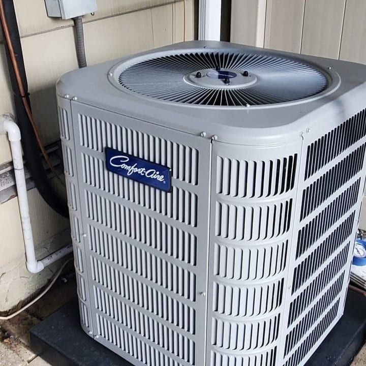 Carrier condenser installed on a paver patio
