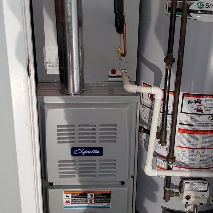 Rheem furnace and water heater installed in a basement with new copper piping